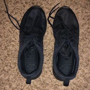All black Nike Roshe Runs